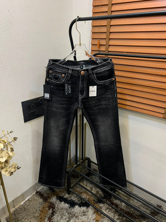 TRUE RELIGION IMPORTED POCKET HEAVY EMBROIDERED BOOT CUT DENIM*