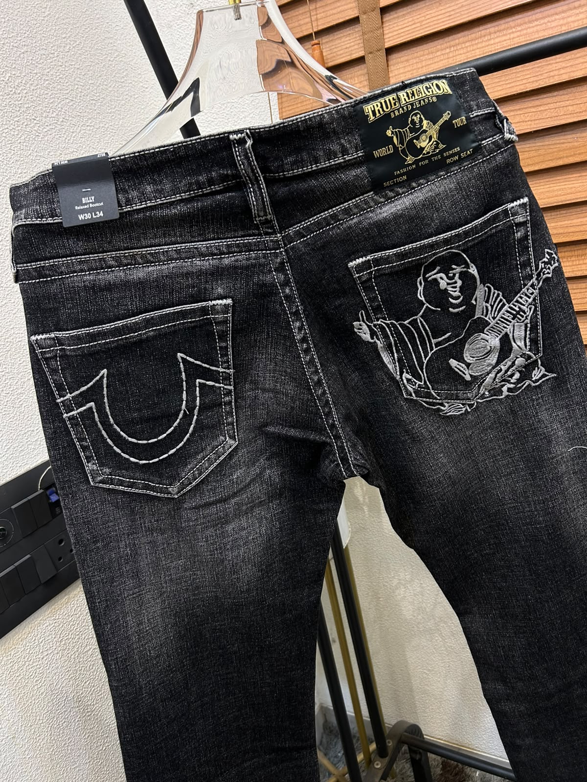 TRUE RELIGION IMPORTED POCKET HEAVY EMBROIDERED BOOT CUT DENIM*