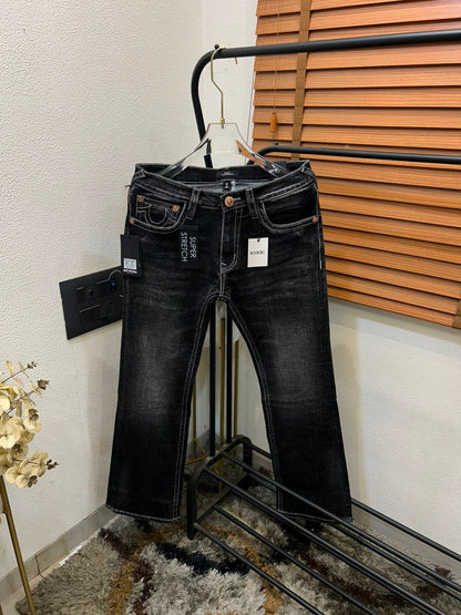 TRUE RELIGION IMPORTED POCKET HEAVY EMBROIDERED BOOT CUT DENIM*