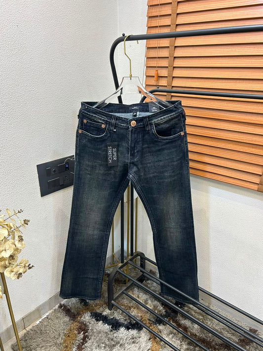 TRUE RELIGION IMPORTED POCKET HEAVY EMBROIDERED BOOT CUT DENIM*