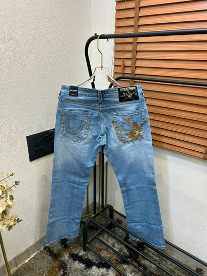 TRUE RELIGION IMPORTED POCKET HEAVY EMBROIDERED BOOT CUT DENIM*