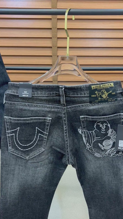 TRUE RELIGION IMPORTED POCKET HEAVY EMBROIDERED BOOT CUT DENIM*